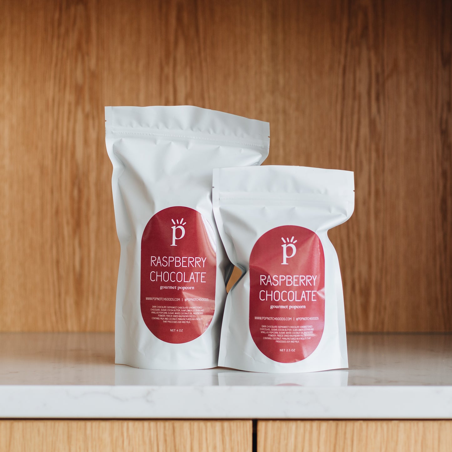 A truly gourmet popcorn. This raspberry chocolate popcorn is hand created with the freshest and highest quality ingredients to deliver an authentic Raspberry Chocolate popcorn. Order online now or stop in to get this delectable treat. Featured is our Large Bag (4oz) and Small bag (2.5oz)