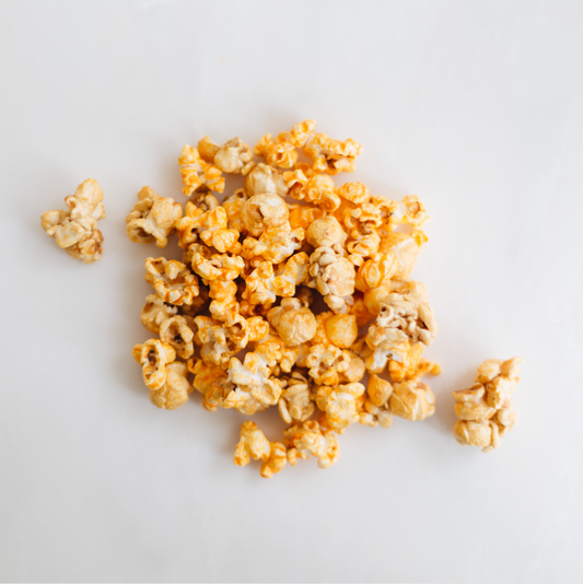 A delicious combination of sweet and savory popcorn. Our Caramel Cheddar popcorn is difficult to put down. Order online now or stop in and grab a bag of this delicious combination of popcorn.