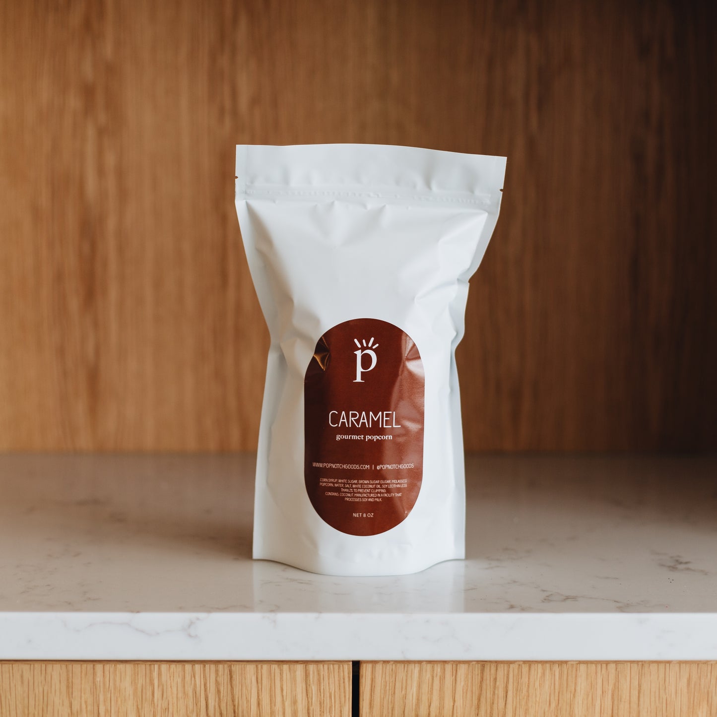 Sweet, Crunchy, and buttery caramel popcorn is the perfect snack to have around the house. Order it now online or stop in our shop to get a bag of this classic gourmet popcorn. Featured is our Large bag of Caramel Popcorn (8oz)